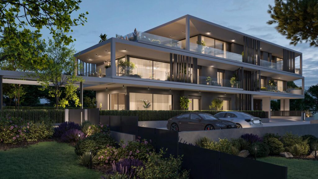 Render serale di Villa Olympia Residences con terrazze illuminate e architettura moderna a Desenzano del Garda